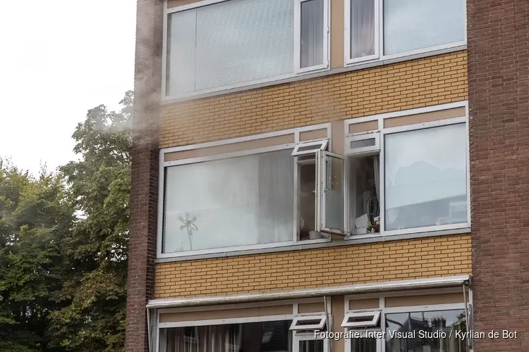 Brand in portiekflat in Haarlem